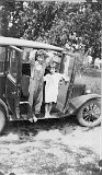 May be Clark and Genevieve Dooley in the car doors.